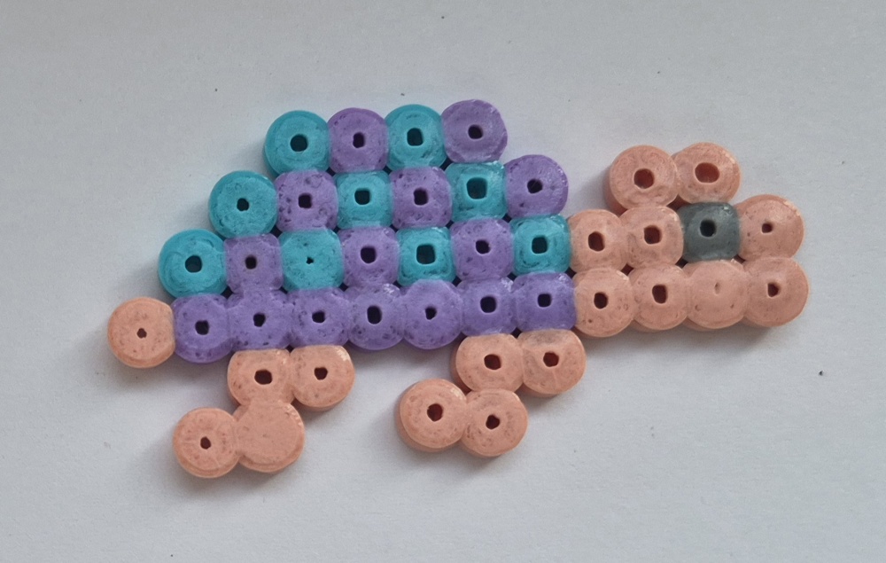 Original peach bead turtle with a purple and turquoise shell